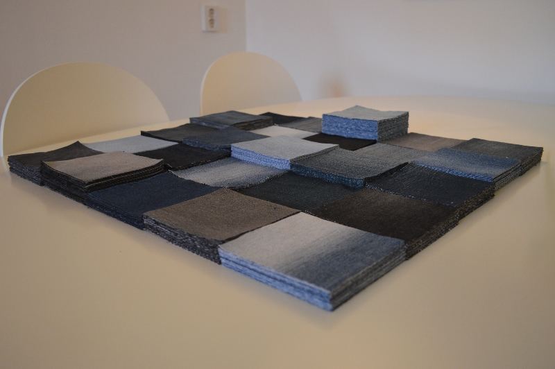 All 25 pair of jeans, neatly sorted.