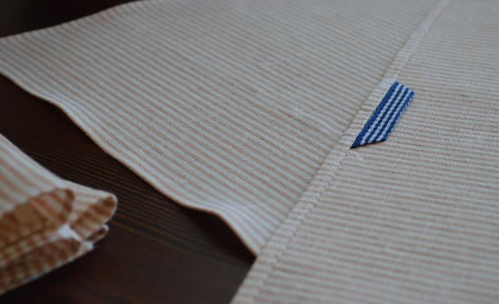 I like the contrast between the towel and the blue hanger.